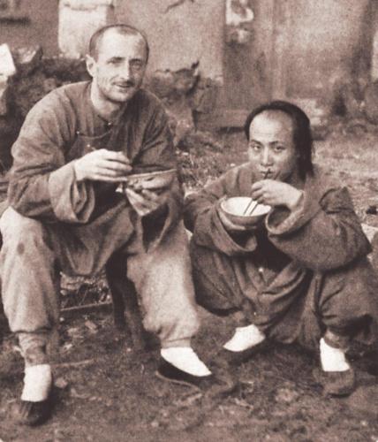 D.E. Hoste (left), one of the Cambridge Seven, having a meal on the street with a Chinese friend, adapting to local custom D.E. Hoste (left), one of the Cambridge Seven, having a meal on the street with a Chinese friend, adapting to local custom